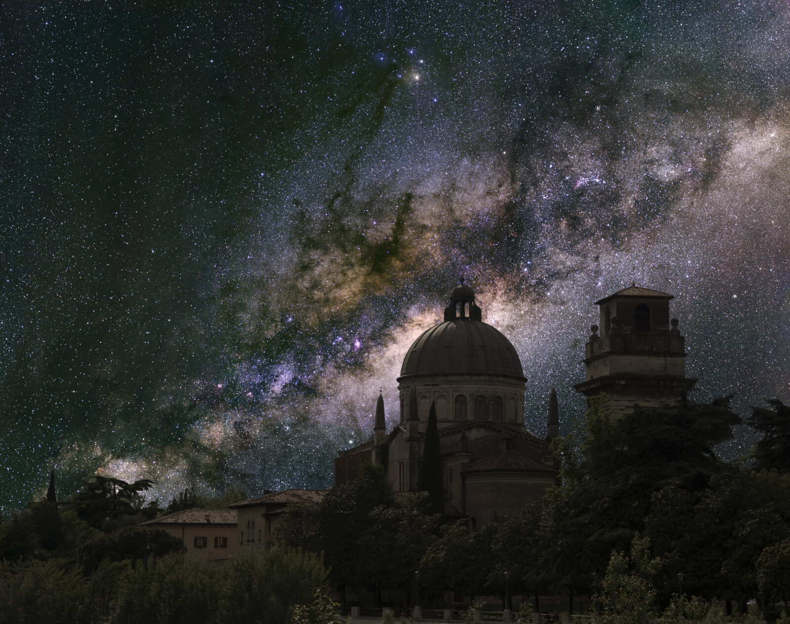 Heaven and Earth. The Milky Way over an Italian church.