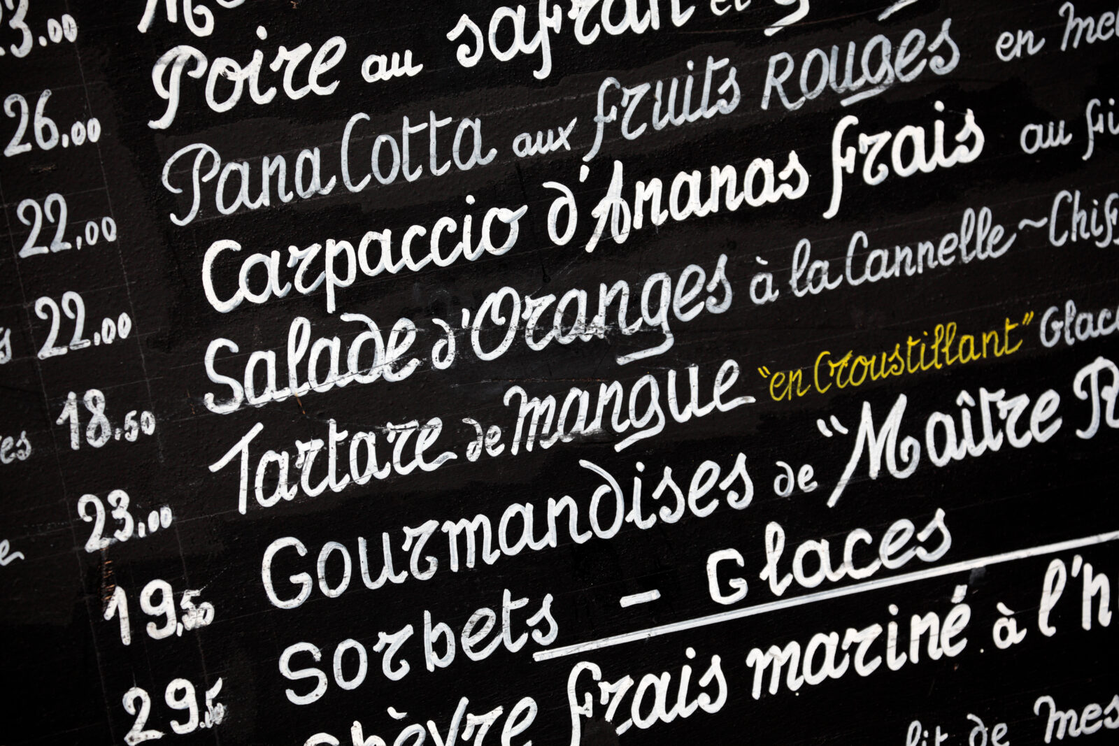 Restaurant french chalk menu board in Paris France closeup photo